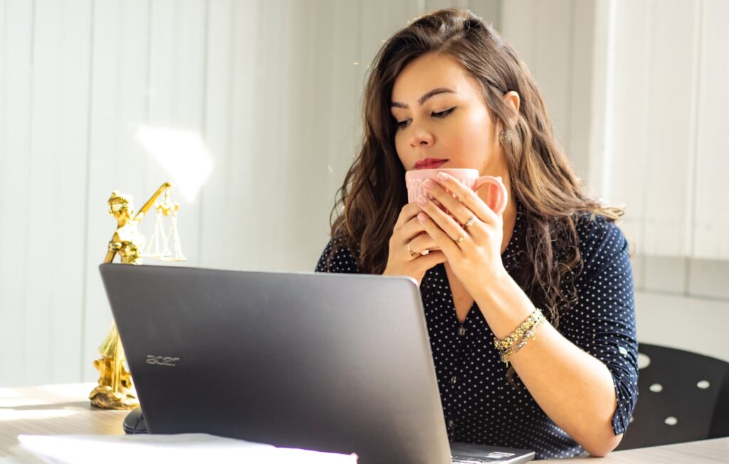 woman looking at laptop