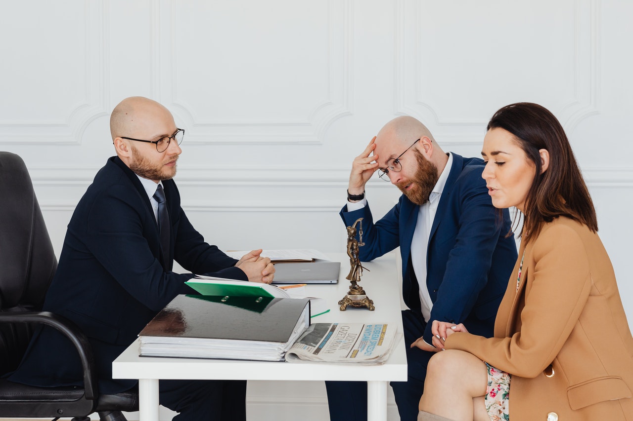 lawyer talking with people